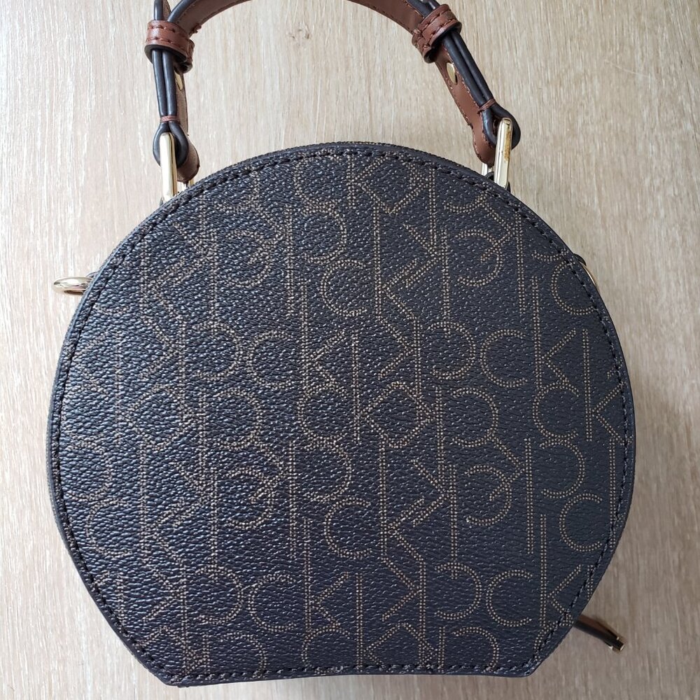 Calvin Klein Dark Brown Monogram Round Crossbody with Tan Handle - Picture 3 of 9